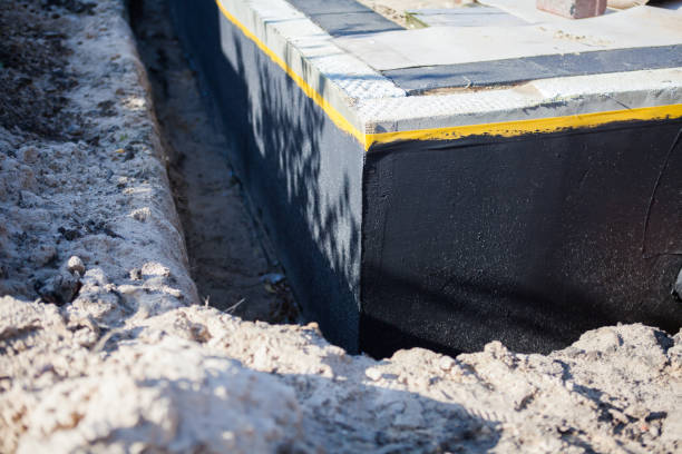 Professional Emergency Waterproofing technician working in Nashville, MI
